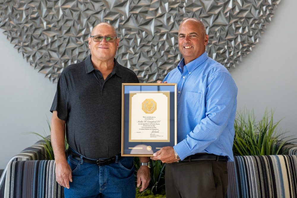 Banks, Crawford recognized for their decades of service