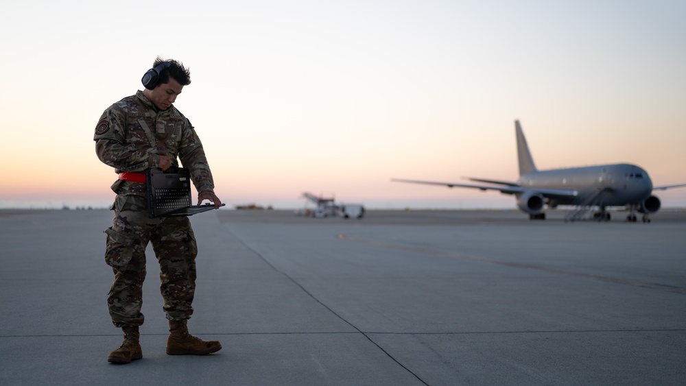 660th AMXS crew chiefs perform pre-flight inspection on KC-46A Pegasus