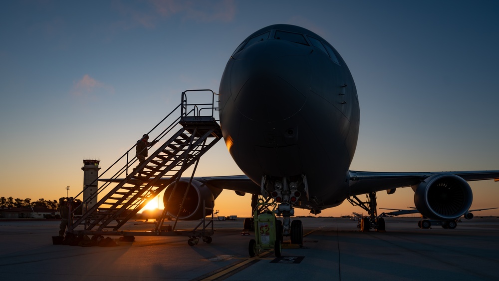 660th AMXS crew chiefs perform pre-flight inspection on KC-46A Pegasus