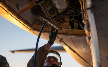 660th AMXS crew chiefs perform pre-flight inspection on KC-46A Pegasus