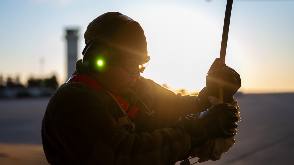 660th AMXS crew chiefs perform pre-flight inspection on KC-46A Pegasus