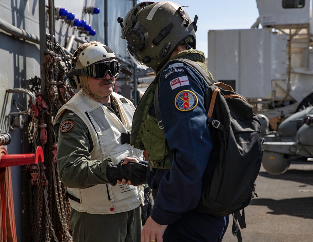 Commander, Task Force 70 (CTF 70) Hosts Royal Navy U.K. Carrier Strike Group