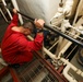 Sailors aboard the USS John Finn conduct an engineering training team drill in the Indian Ocean