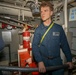 Sailors aboard the USS John Finn conduct an engineering training team drill in the Indian Ocean