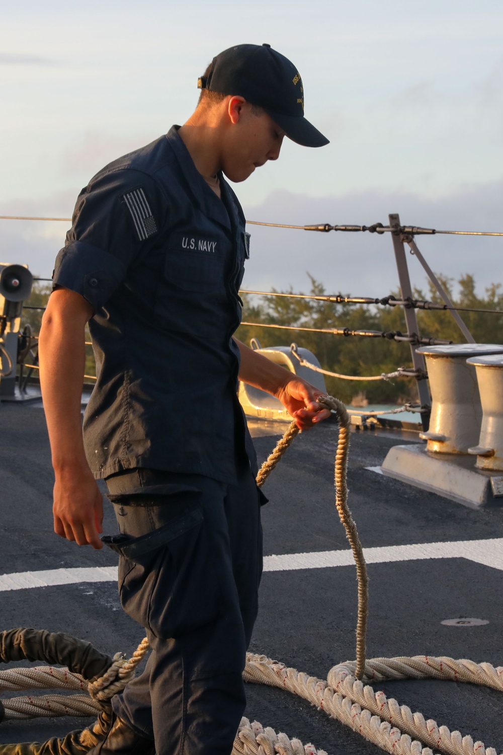 Sailors aboard the USS John Finn conduct a sea and anchor detail in Diego Garcia