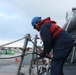 Sailors aboard the USS John Finn conduct a sea and anchor detail in Diego Garcia