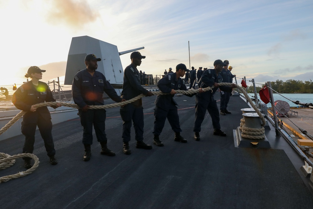 Sailors aboard the USS John Finn conduct a sea and anchor detail in Diego Garcia