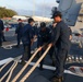 Sailors aboard the USS John Finn conduct a sea and anchor detail in Diego Garcia