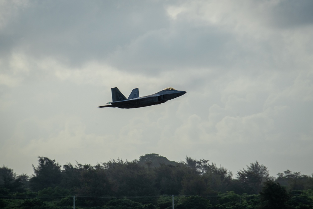 JBER F-22s land in Tinian during REFORPAC
