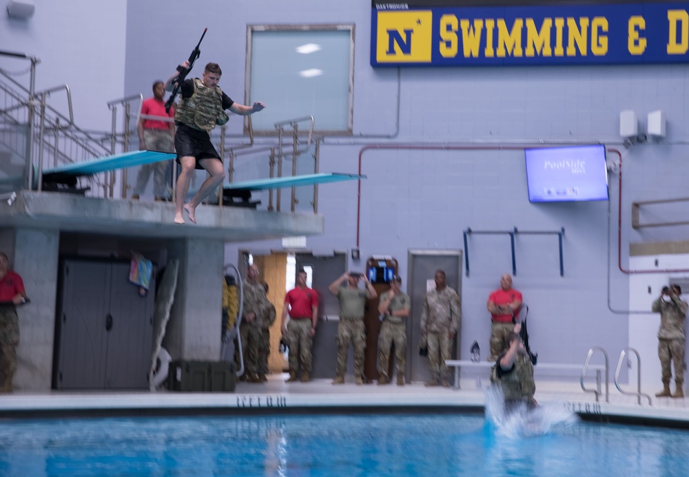 Spc. Alexander Thomson and Sgt. Kristopher Piwowarczyk jump into Combat Water Survival Test - 2025 National Best Warrior