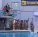 Spc. Alexander Thomson and Sgt. Kristopher Piwowarczyk jump into Combat Water Survival Test - 2025 National Best Warrior