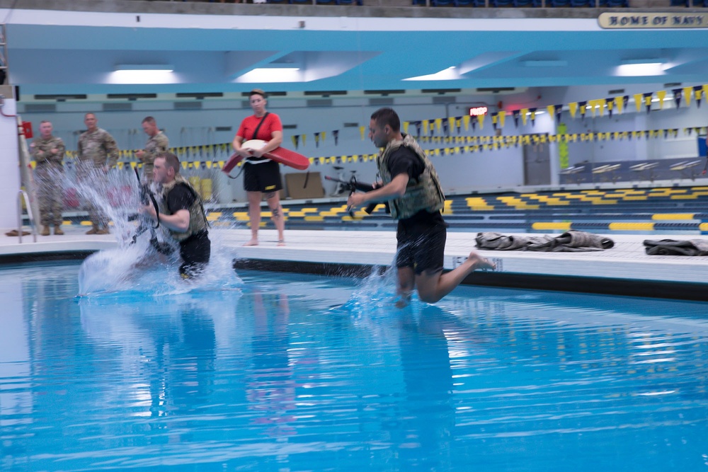 Competitors jump into Combat Water Survival Test - 2025 National Best Warrior