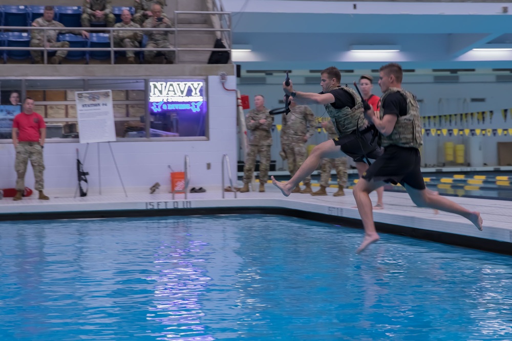 Competitors jump into Combat Water Survival Test - 2025 National Best Warrior