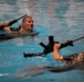 Sgt. Matthew Lee swims participates in a combat water survival test - 2025 National Best Warrior