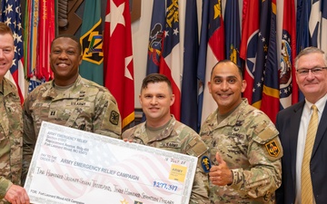Fort Leonard Wood AER team presents check to MSCoE leaders