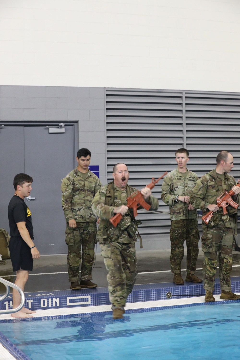 Infantry dives into water survival training