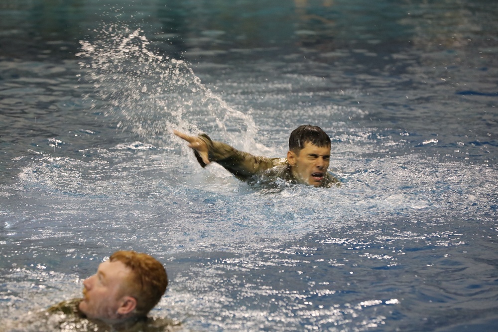 Infantry dives into water survival training