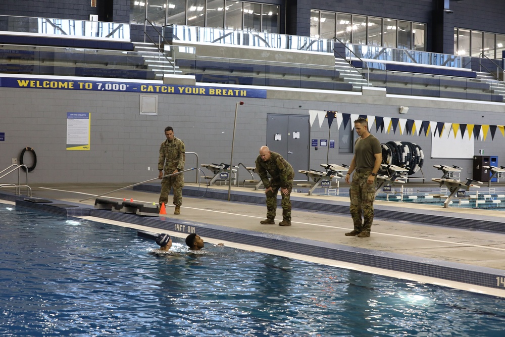 Infantry dives into water survival training