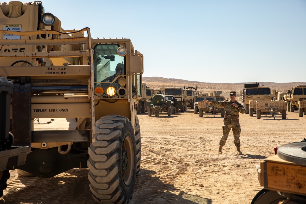 Army National Guard units prepare equipment and vehicles for NTC