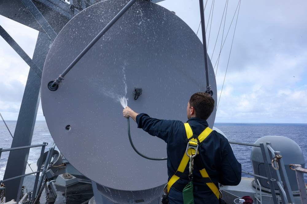 USS Bainbridge (DDG 96) Sailor Conducts Freshwater Washdown