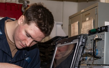 USS Gerald R. Ford (CVN 78) Sailor Conducts Maintenance