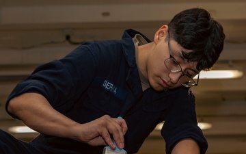 USS Gerald R. Ford (CVN 78) Sailor Conducts Maintenance