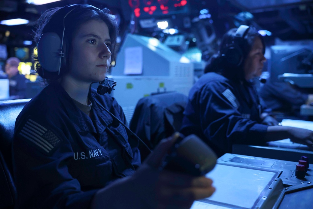 USS Forrest Sherman (DDG 98) Sailors stand watch in CIC.