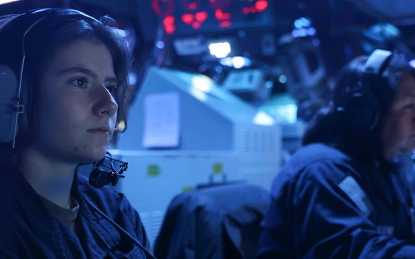 USS Forrest Sherman (DDG 98) Sailors stand watch in CIC.