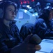 USS Forrest Sherman (DDG 98) Sailors stand watch in CIC.