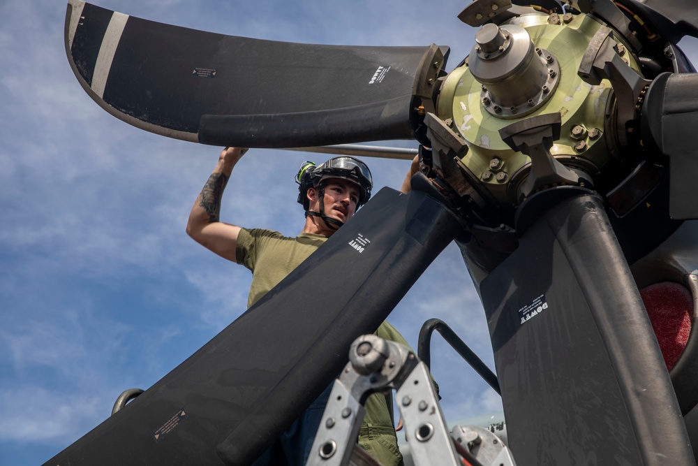 U.S. Marines perform maintenance during Talisman Sabre 25