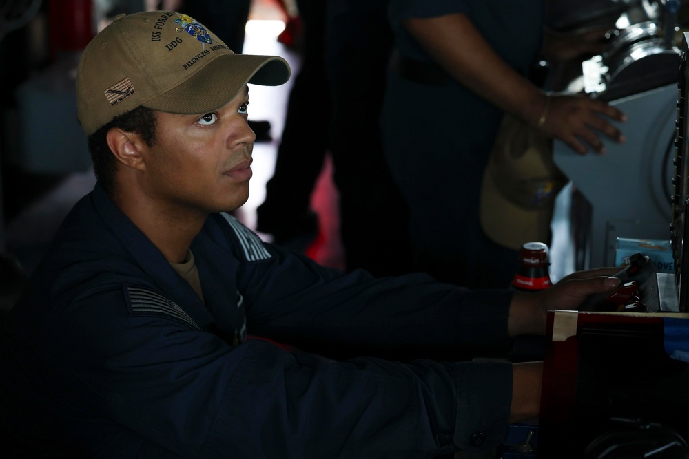 USS Forrest Sherman (DDG 98) Sailors stand watch.