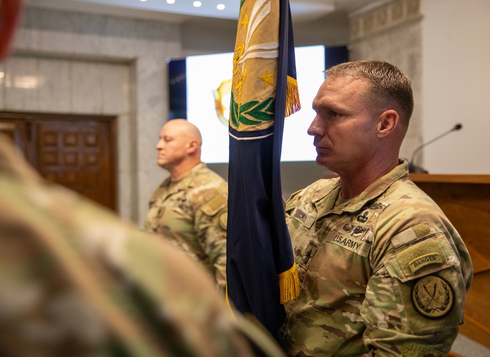 Command Sgt. Maj. Daniel Rose Holds CJTF-OIR Colors During Change of Command Ceremony