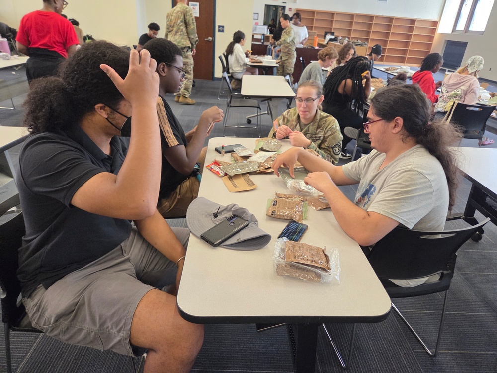 Army Recruiter Sparks Student Curiosity With MRE Demo During Breakout Session