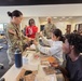 Army Recruiters Teach MRE Heating Techniques in Hands-On Student Demo