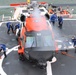 Coast Guard Cutter Escanaba and Air Station Elizabeth City crew members conduct helicopter-ship qualification training in the Chesapeake Bay