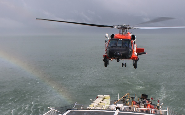 Coast Guard Cutter Escanaba and Air Station Elizabeth City crew members conduct helicopter-ship qualification training in the Chesapeake Bay
