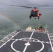 Coast Guard Cutter Escanaba and Air Station Elizabeth City crew members conduct helicopter-ship qualification training in the Chesapeake Bay
