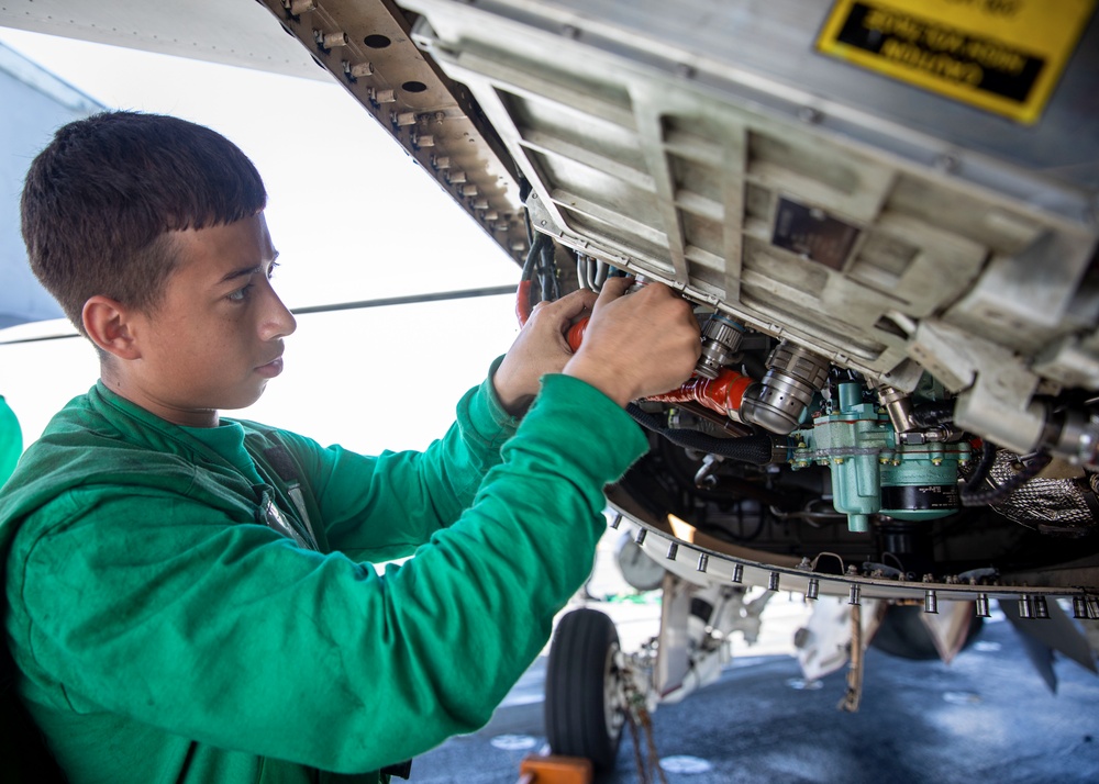USS Gerald R. Ford (CVN 78) Sailor Conducts Routine Aircraft Maintenance