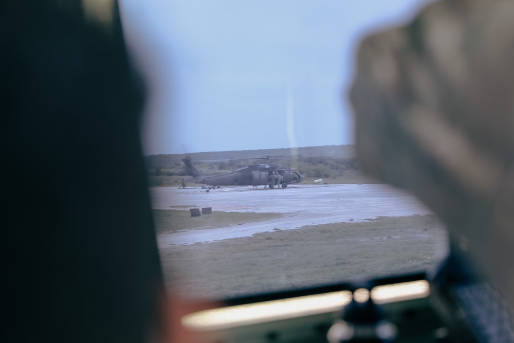 2-227th Aviation Regiment Commander visits Forward Arming and Refueling Point crews for Aerial Gunnery