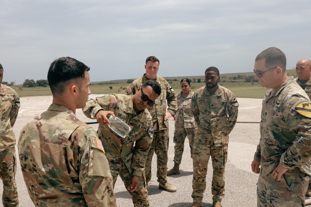 2-227th Aviation Regiment Commander visits Forward Arming and Refueling Point crews for Aerial Gunnery