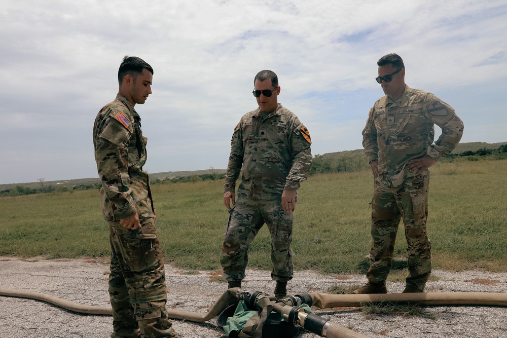 2-227th Aviation Regiment Commander visits Forward Arming and Refueling Point crews for Aerial Gunnery