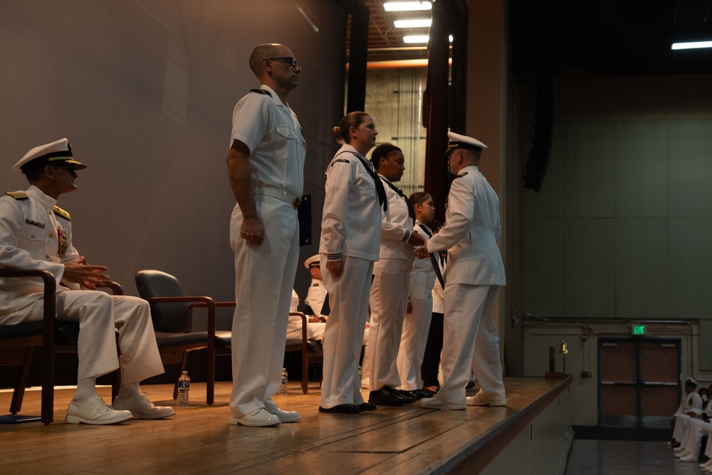 Capt. Clark relinquishes command to Capt. Cleckley