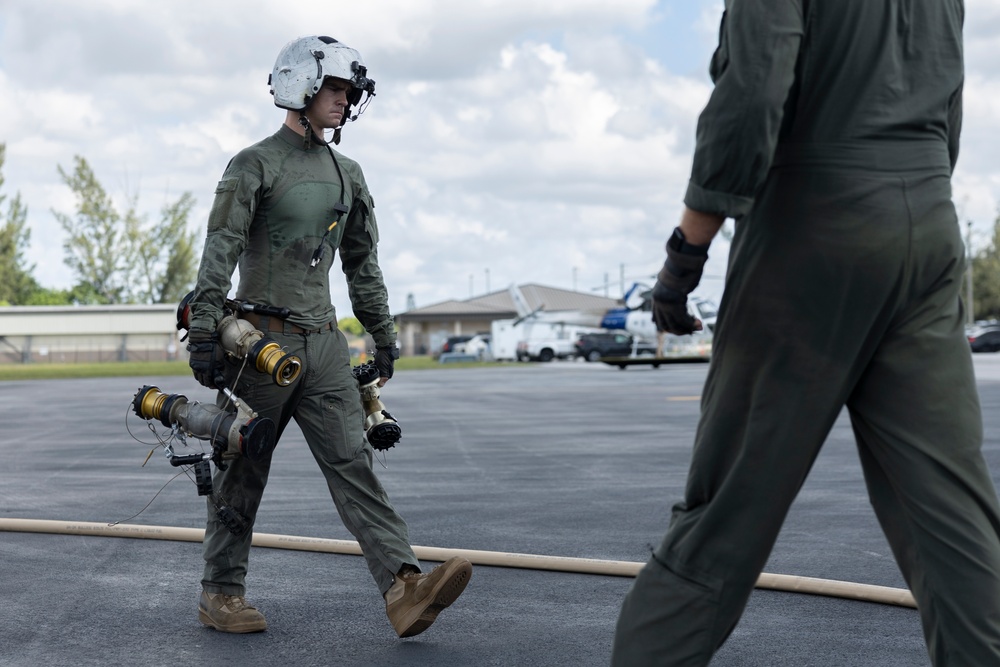 U.S. Marines with HMH-461 conduct flight operations and simulate air-delivered ground refueling