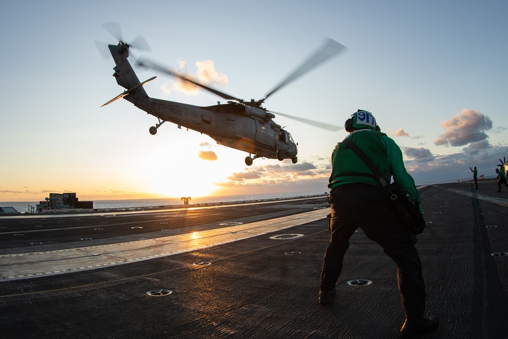 George Washington Conducts Flight Operations at Sunset