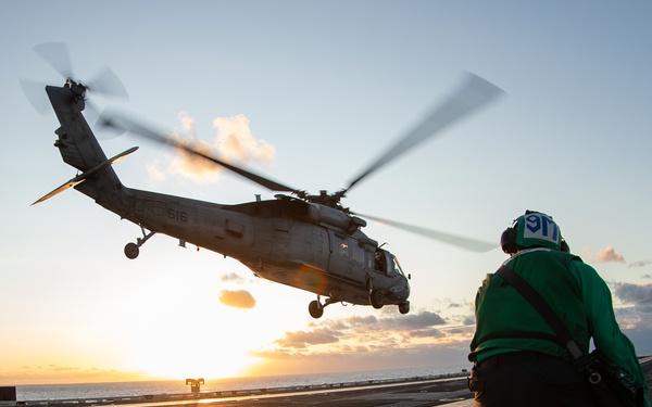 George Washington Conducts Flight Operations at Sunset