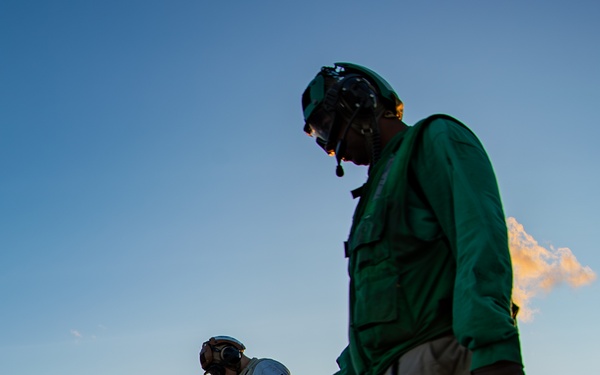 George Washington Conducts Flight Operations at Sunset