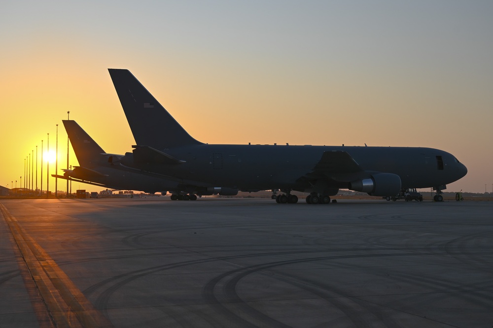 USAF KC-135s and a KC-46 await night flights during Talisman Sabre 25
