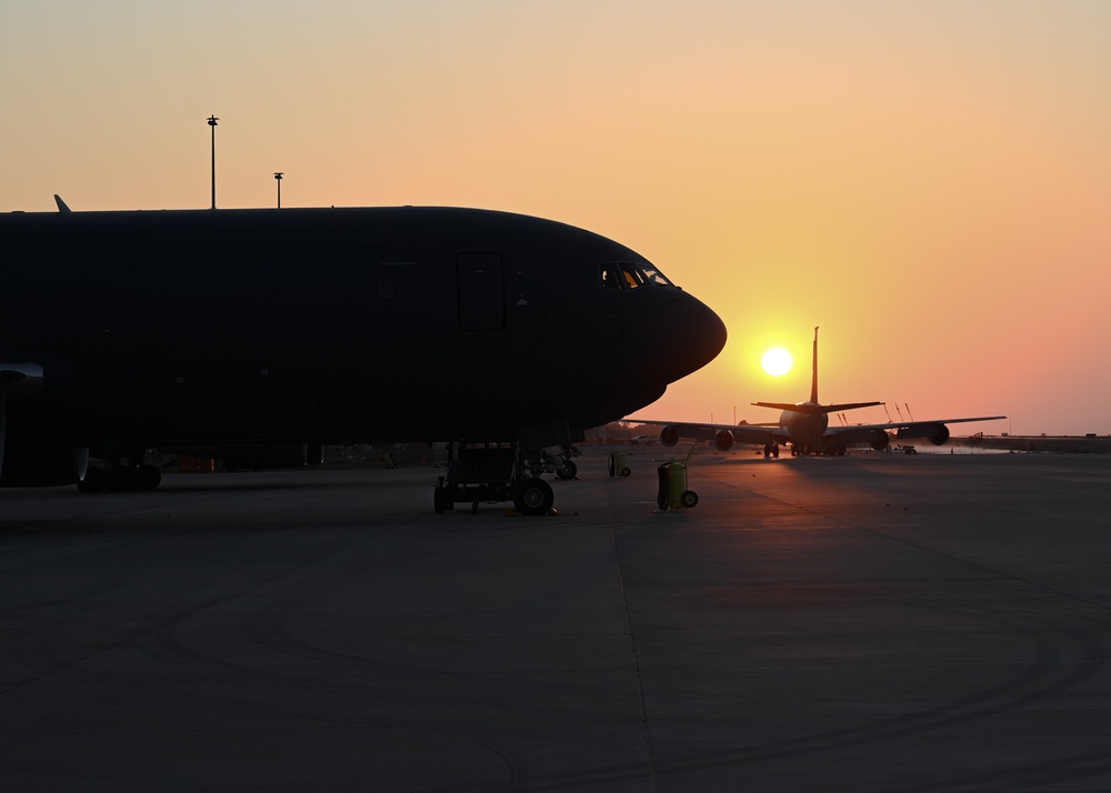 USAF KC-135s and a KC-46 await night flights during Talisman Sabre 25