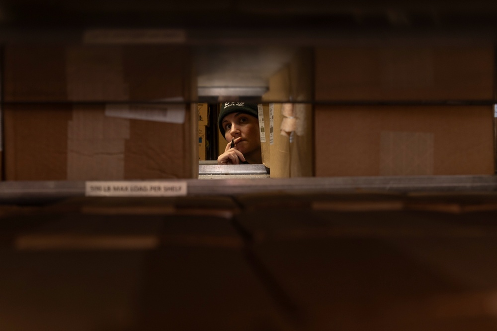 USS Gerald R. Ford (CVN 78) Sailor Conducts Inventory