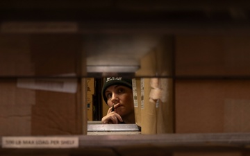 USS Gerald R. Ford (CVN 78) Sailor Conducts Inventory